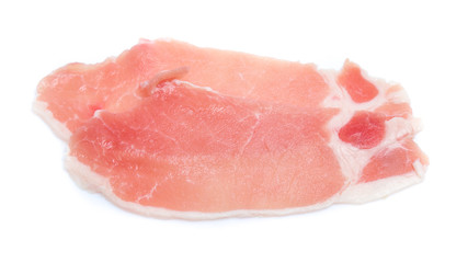 Raw pork meat with parsley herb leaves isolated on white background