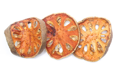 Dry bael fruit on white background