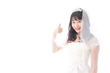 OKサインをするドレス姿の花嫁