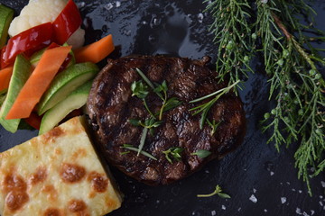 delicious baked steak with vegetables