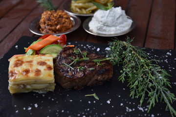 delicious baked steak with vegetables