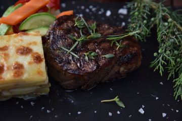 delicious baked steak with vegetables