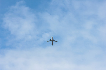 aircraft on a background of blue cloudy sky