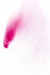 Freeze motion of purple color powder exploding on white background.