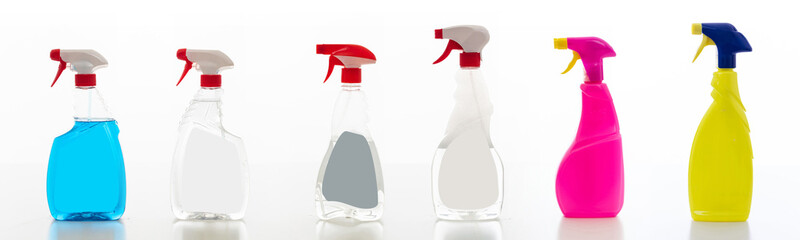 Cleaning spray bottles set isolated against white background. - obrazy, fototapety, plakaty