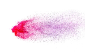 Freeze motion of purple color powder exploding on white background.