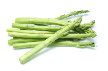 Fresh green asparagus on white