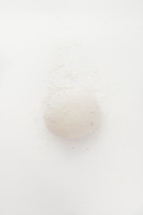 Baking cereal bread a Step by step guide to bake cereal bread,  top view on a white board, dough is spread to be executed the folding process