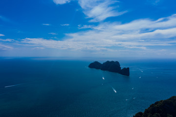 Beautiful panoramic view over Tonsai and Dalum Beach. Green jungles and hot stones on the bright...