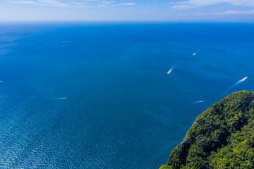 Aerial drone photo of iconic tropical turquoise water Pileh Lagoon surrounded by limestone cliffs,...