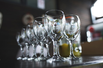 enpty glasses on wooden surface