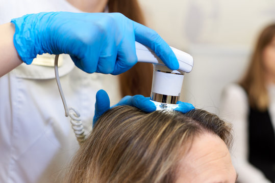 Microscopic examination of the hair and skin of the scalp.