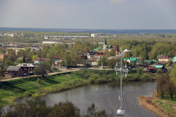 Fototapeta na wymiar Vologda. The view from the top. Sunny spring day. Crosses of the domes of St. Sophia Cathedral