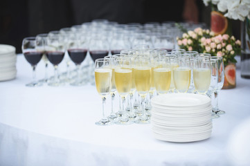 glasses with champagne on table