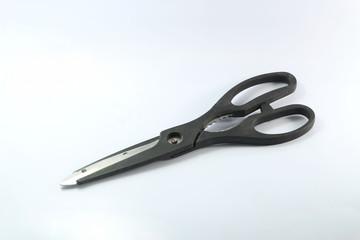 Black scissors and white background