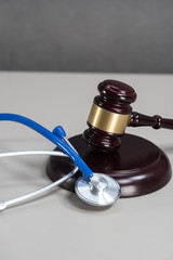 Gavel and stethoscope. medical jurisprudence. legal definition of medical malpractice. 