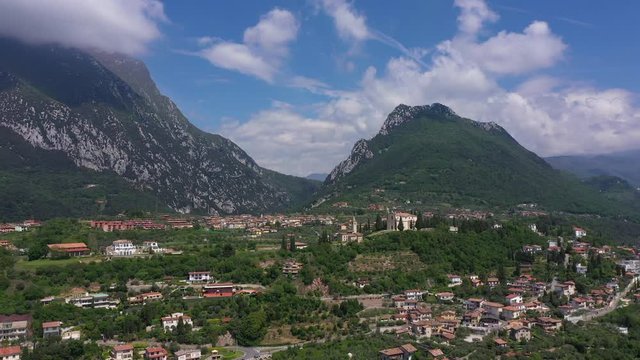 Aerial view, church Chiesa di San Michele Arcangelo, Italy. In the background Lake Garda	