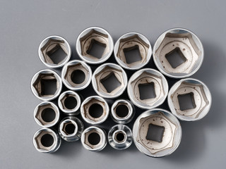 auto repair wrenches on a gray background