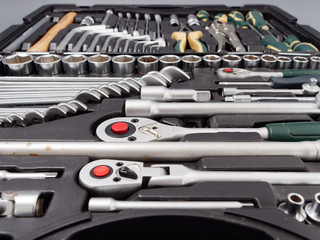 auto repair wrenches on a gray background
