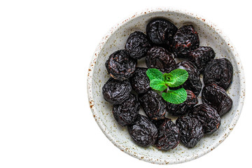 prunes, dried plums (tasty and healthy fruits) menu concept. background. top view. copy space