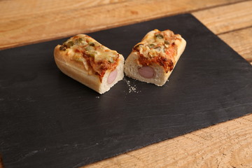 hot dog with cheese and pepper