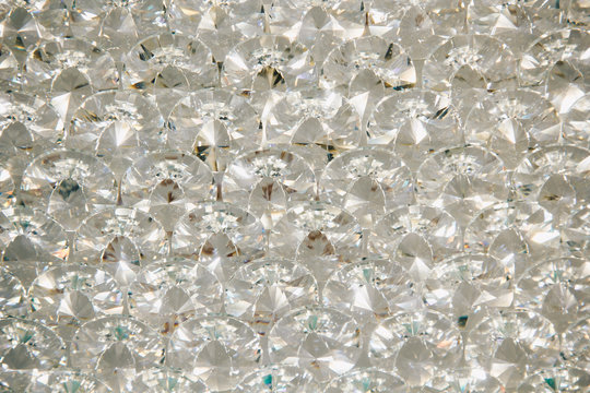 Beautiful shiny diamonds swarovski crystal background. Luxury, wealth. Cover pattern. Macro photo, close up of expensive stones.