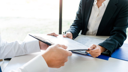 Job interview, Corporate business Employer or recruiter around the table during interviewing recruitment process concept.