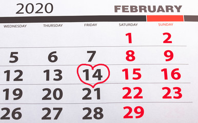 calendar with a special date for Valentine's day marked with a heart