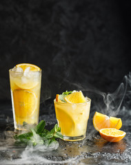 Cocktail screwdriver. Homemade orange cocktail with mint and vodka. Rum with orange juice