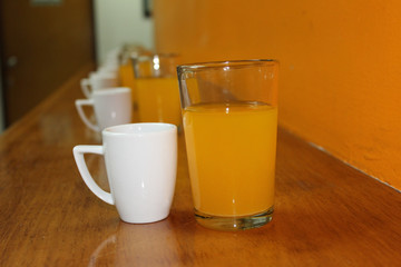 Cup of coffee and a glass of orange juice