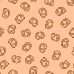 Pretzel seamless pattern on a beige background. Pastries, baked goods, snacks for the holiday. Baby treat, with poppy seeds.Rosy pretzel.Vector