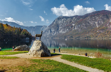 Beautiful sunny landscape. View on mountain lake with crystal clear azure water in Julian Alps....