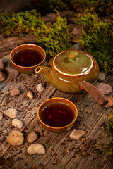 Obraz na płótnie Canvas Cup of tea and teapot