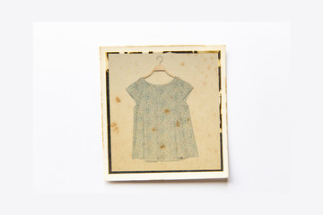 blouse on vintage frame background.