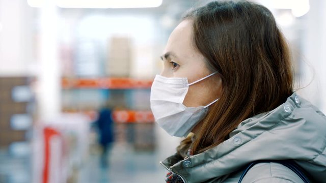 Woman in protective medical mask. Health care and medical concept.