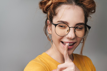 Close up of a cute young teenage girl wearing glasses