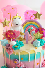 Fototapeta na wymiar Party cake with unicorn for first birthday