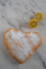 heart shaped lemon cake on a table