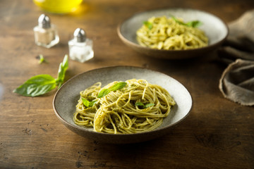 Spaghetti with pesto sauce and fresh basil