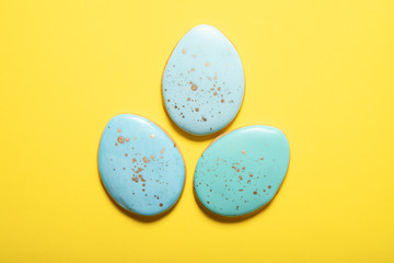 Easter cookies on a yellow background. Top view. Place for text. Easter eggs