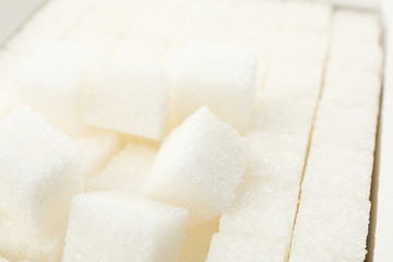 White sugar cubes texture background, close up