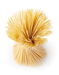 Uncooked dried spaghetti pasta isolated on white background with clipping path - obrazy, fototapety, plakaty