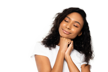 happy african american woman with closed eyes isolated on white