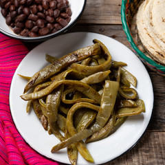 Mexican grilled nopal cactus on wooden background