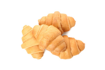 Freshly baked croissants isolated on white background