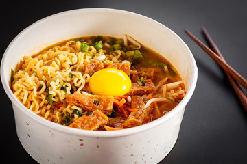 Classic Korean Ramen Noodle Bowl with a Raw Egg Yolk