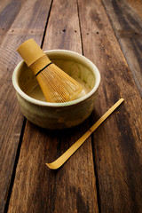Japanese maccha green tea on wood plank