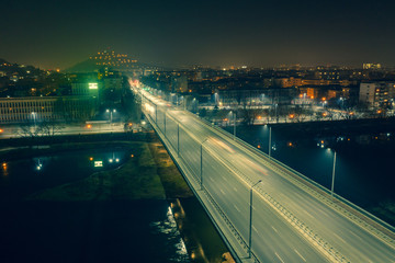 Fototapeta premium Aerial view of bridge over Maritsa river in Plovdiv during the night