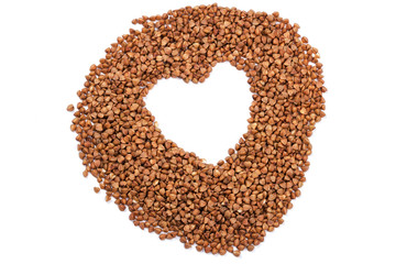 Close up of buckwheat grains isolated on white background