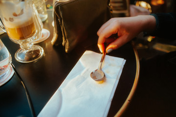 Used spoon after drinking affogato at a cafe in Paris